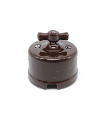 INTERRUPTOR- CONMUTADOR SUPERFICIE PORCELANA MARRON 10A 250V